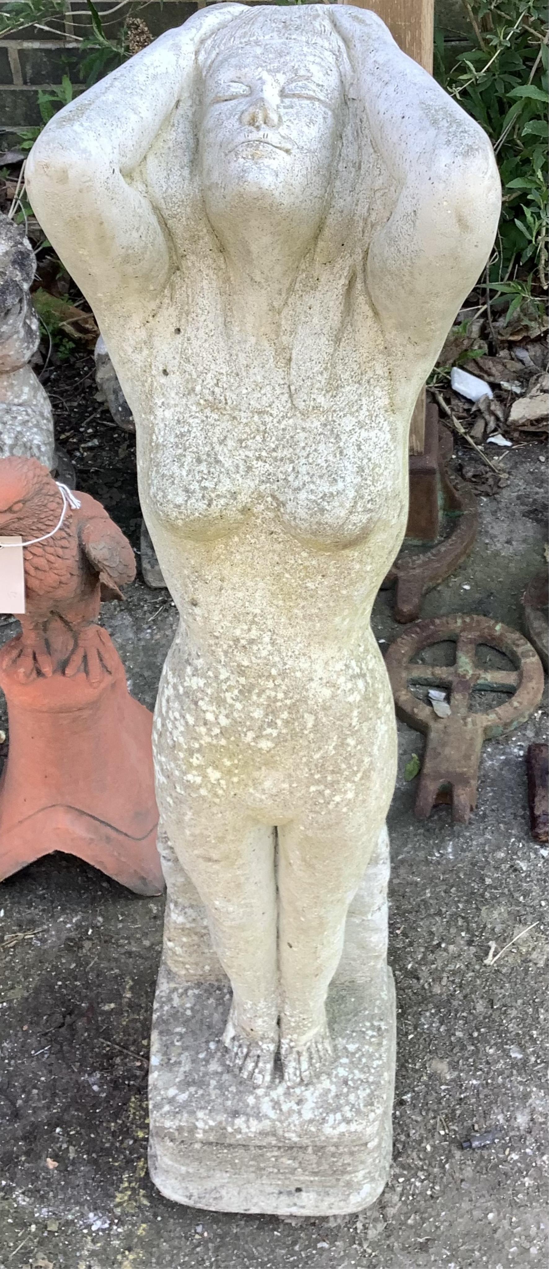 A reconstituted stone garden ornament, height 94cm